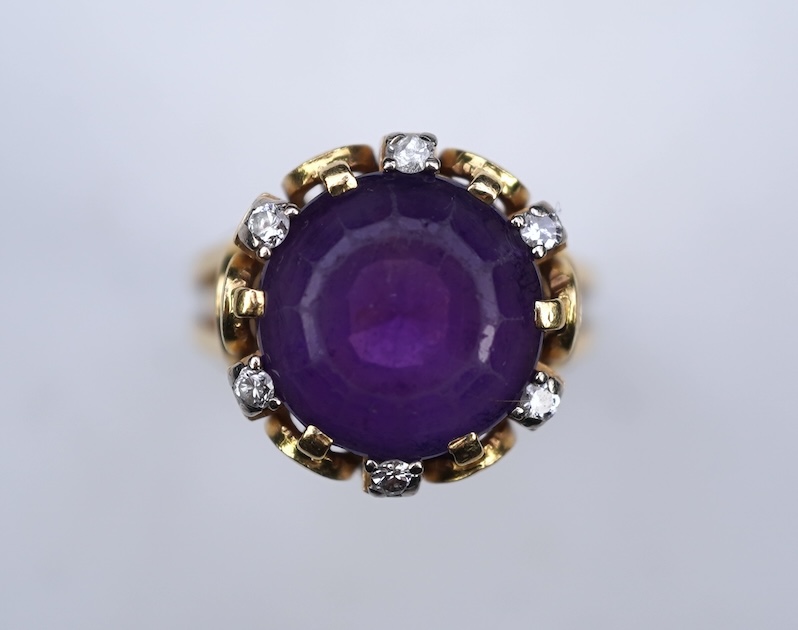 A stylish amethyst and diamond ring